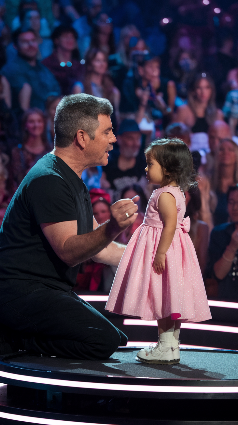 This long awaited moment, Simon Cowell pressed the button, knelt down and begged sing again