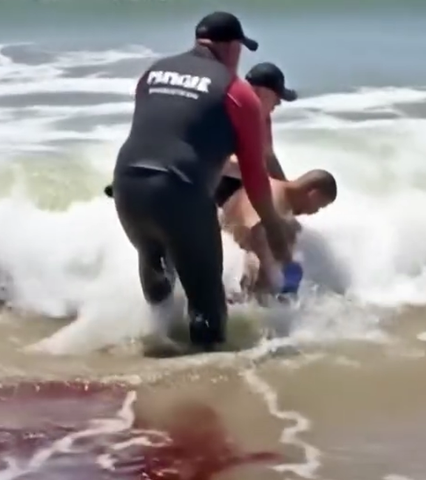 Surfer Fights Off Shark During Competition