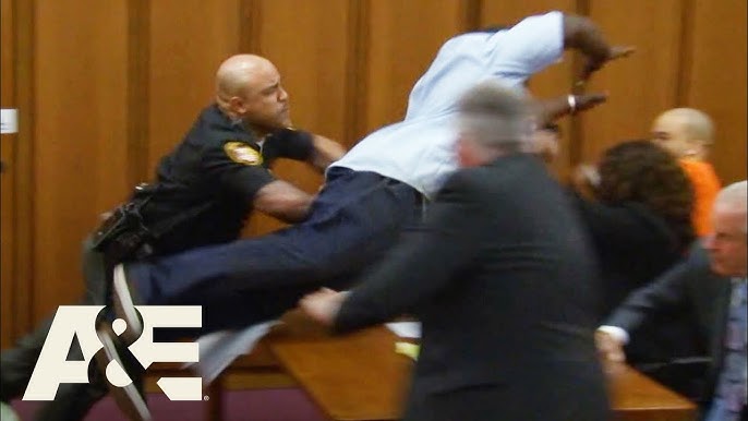 Father attacks daughter’s killer in court
